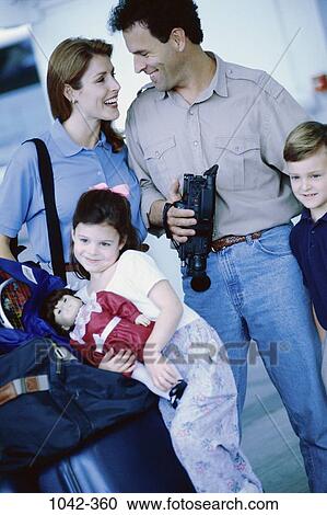 people, luggage, happy, doll, holding, outdoors, camera View Large Photo Image Stock Image - people, luggage, happy, doll, holding, outdoors, camera. Fotosearch