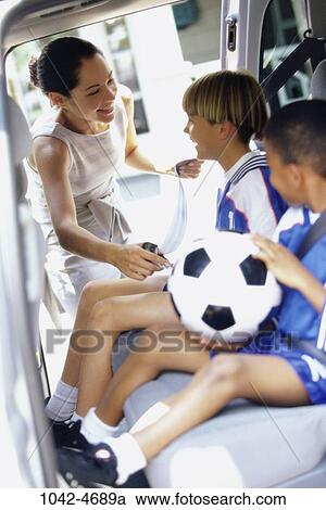 Stock Image - people, mother, ball, outdoors, sports, family, happiness. Fotosearch