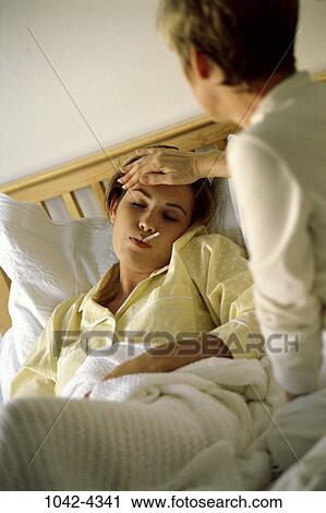 people, mother, bed, cold, thermometer, nurturing, family View Large Photo Image Stock Image - people, mother, bed, cold, thermometer, nurturing, family. Fotosearch