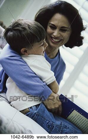 Stock Image - people, mother, family, parent, indoors, Mothers indoors. Fotosearch