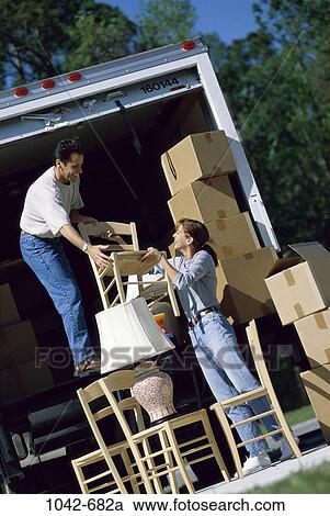 people, moving, couple, lifestyles, outdoors, teamwork, new home View Large Photo Image Stock Image - people, moving, couple, lifestyles, outdoors, teamwork, new home. Fotosearch