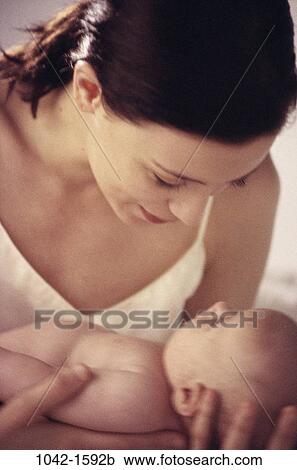 people, new, mother, Hispanic, baby, holding, newborn View Large Photo Image Stock Image - people, new, mother, Hispanic, baby, holding, newborn. Fotosearch