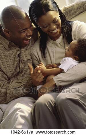 people, nurturing, commitment, unity, family, indoors, African-American View Large Photo Image Stock Image - people, nurturing, commitment, unity, family, indoors, African-American. Fotosearch
