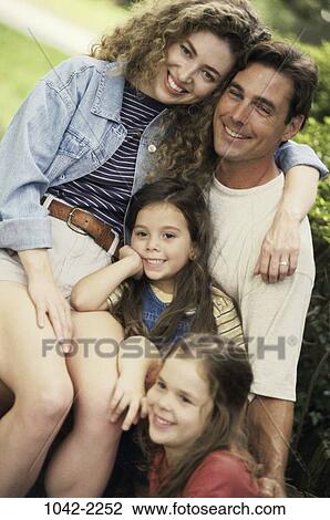 people, outdoors, family, daughters, portrait, parents, Caucasian View Large Photo Image Stock Image - people, outdoors, family, daughters, portrait, parents, Caucasian. Fotosearch