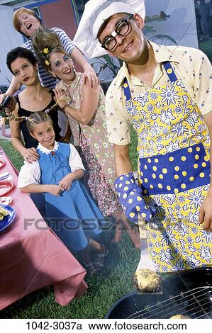 people, outdoors, family, humor, food, apron, food preparation View Large Photo Image Stock Image - people, outdoors, family, humor, food, apron, food preparation. Fotosearch