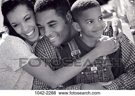 people, outdoors, hugging, unity, family, hug View Large Photo Image Stock Photo - people, outdoors, hugging, unity, family, hug. Fotosearch