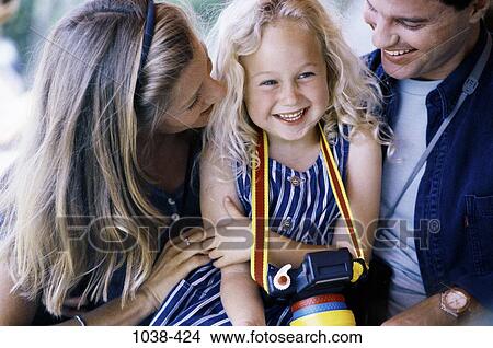 people, outdoors, nurturing, camera, family, daughter, Caucasian View Large Photo Image Picture - people, outdoors, nurturing, camera, family, daughter, Caucasian. Fotosearch