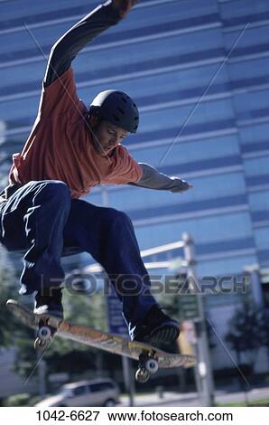 Stock Photo - people, outdoors, sports, skateboard, Caucasian. Fotosearch