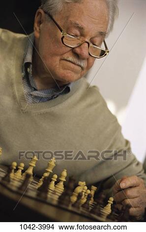 people, playing, chess, eyeglasses, senior, play View Large Photo Image Picture - people, playing, chess, eyeglasses, senior, play. Fotosearch