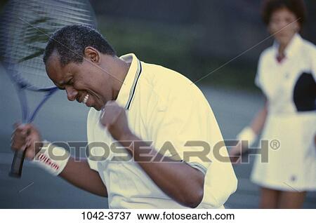 people, playing, couple, tennis, gesturing, motion, outdoors View Large Photo Image Stock Photo - people, playing, couple, tennis, gesturing, motion, outdoors. Fotosearch