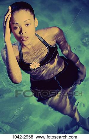 people, pool, woman, head, outdoors, serious, touching View Large Photo Image Stock Photo - people, pool, woman, head, outdoors, serious, touching. Fotosearch