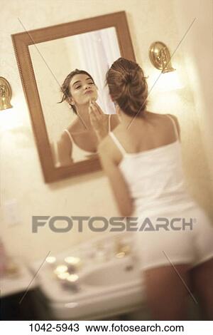 people, reflection, woman, mirror, makeup, looking, reflecting View Large Photo Image Stock Image - people, reflection, woman, mirror, makeup, looking, reflecting. Fotosearch