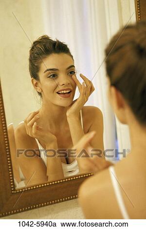 people, reflection, woman, smiling, mirror, reflecting, smile View Large Photo Image Stock Image - people, reflection, woman, smiling, mirror, reflecting, smile. Fotosearch