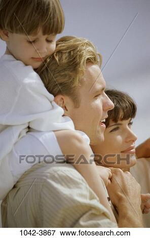 people, relaxation, outdoors, relaxing, carrying, commitment, family View Large Photo Image Stock Photo - people, relaxation, outdoors, relaxing, carrying, commitment, family. Fotosearch