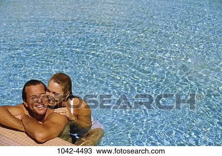 people, relaxation, water, pool, ripples, couple View Large Photo Image Stock Image - people, relaxation, water, pool, ripples, couple. Fotosearch