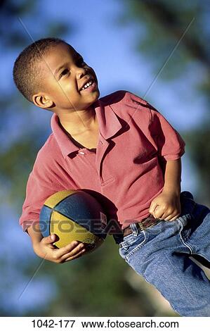 people, running, ball, football, boy, outdoors, child View Large Photo Image Stock Photo - people, running, ball, football, boy, outdoors, child. Fotosearch