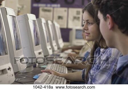 Stock Image - people, school, computers, education, learning, using, high school. Fotosearch