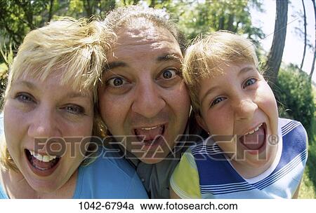 Stock Image - people, shouting, trees, outdoors, family, daughter, yelling. Fotosearch