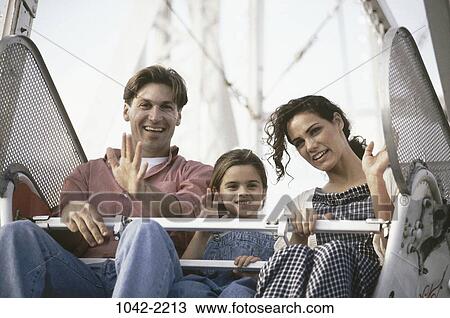 people, sitting, riding, outdoors, park, amusement, entertainment View Large Photo Image Stock Image - people, sitting, riding, outdoors, park, amusement, entertainment. Fotosearch
