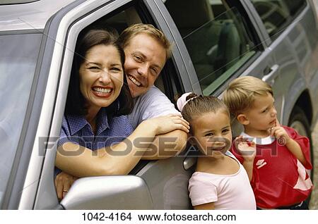 people, smiling, car, outdoors, family, happiness, vehicle View Large Photo Image Picture - people, smiling, car, outdoors, family, happiness, vehicle. Fotosearch