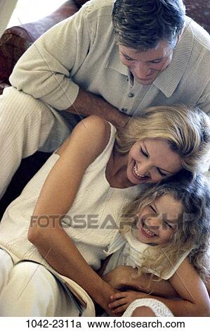 people, smiling, chair, sitting, sunlight, mother, laughing View Large Photo Image Stock Image - people, smiling, chair, sitting, sunlight, mother, laughing. Fotosearch