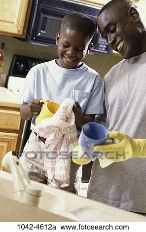 Stock Image - people, smiling, cleaning, towel, smile, family. Fotosearch