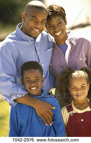 people, smiling, confident, outdoors, unity, family, posing View Large Photo Image Stock Photograph - people, smiling, confident, outdoors, unity, family, posing. Fotosearch