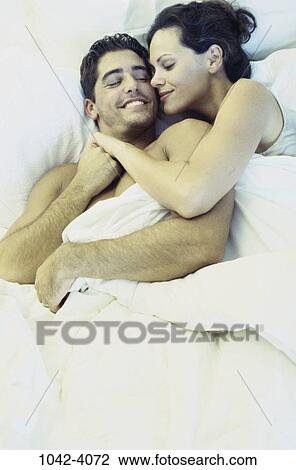 people, smiling, couple, bed, tranquility, smile, tranquil View Large Photo Image Stock Image - people, smiling, couple, bed, tranquility, smile, tranquil. Fotosearch