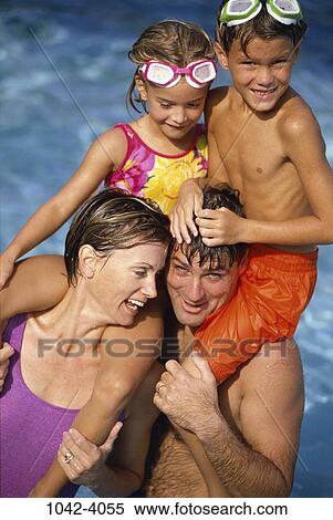 Stock Photography - people, smiling, laughing, holding, goggles, carrying, smile. Fotosearch