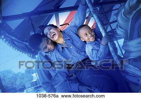 people, smiling, laughing, horse, outdoors, park, amusement View Large Photo Image Stock Image - people, smiling, laughing, horse, outdoors, park, amusement. Fotosearch