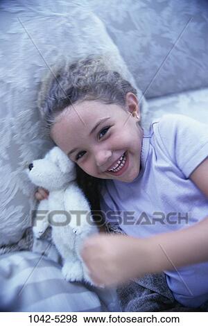 people, smiling, laughing, stuffed animal, holding, girl, smile View Large Photo Image Stock Photo - people, smiling, laughing, stuffed animal, holding, girl, smile. Fotosearch