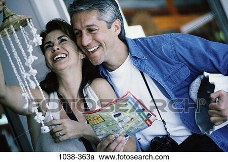 people, smiling, map, laughing, Middle-aged, couples outdoors, camera View Large Photo Image Stock Image - people, smiling, map, laughing, Middle-aged, couples outdoors, camera. Fotosearch