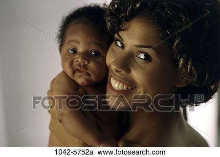 people, smiling, mother, baby, holding, mouth View Large Photo Image Stock Image - people, smiling, mother, baby, holding, mouth. Fotosearch
