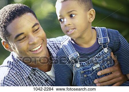 people, smiling, outdoors, hugging, smile, family View Large Photo Image Picture - people, smiling, outdoors, hugging, smile, family. Fotosearch
