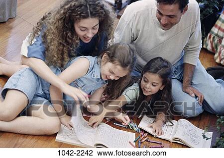 people, smiling, sitting, mother, Hispanic, floor, laughing View Large Photo Image Stock Image - people, smiling, sitting, mother, Hispanic, floor, laughing. Fotosearch