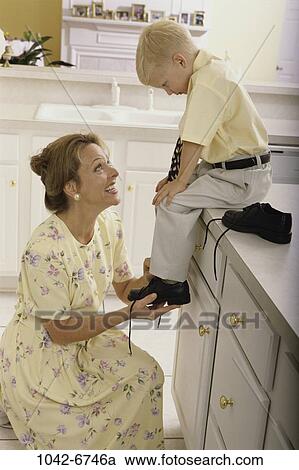 people, smiling, suit, mother, dress, shoes, cooperation View Large Photo Image Stock Image - people, smiling, suit, mother, dress, shoes, cooperation. Fotosearch
