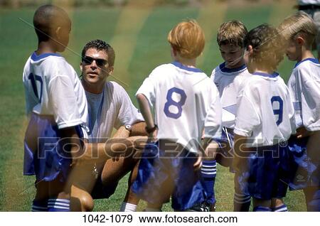 people, sports, children, game, boys, uniforms, coaching View Large Photo Image Stock Photo - people, sports, children, game, boys, uniforms, coaching. Fotosearch