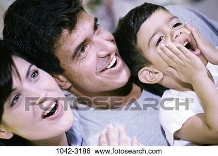 people, staring, awe, watching, family, surprise View Large Photo Image Stock Photograph - people, staring, awe, watching, family, surprise. Fotosearch