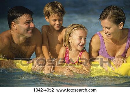 people, swim, floating, water, pool, smiling, swimming View Large Photo Image Stock Image - people, swim, floating, water, pool, smiling, swimming. Fotosearch