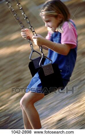 people, swinging, girl, swing, playground, outdoors, play View Large Photo Image Stock Photo - people, swinging, girl, swing, playground, outdoors, play. Fotosearch