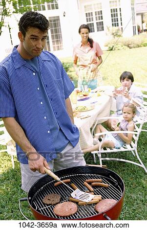 people, table, cooking, hamburger, picnic, outdoors, family View Large Photo Image Stock Image - people, table, cooking, hamburger, picnic, outdoors, family. Fotosearch
