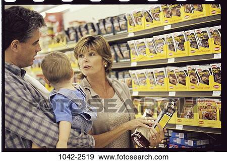 Stock Photo - people, talking, shopping, family, store. Fotosearch