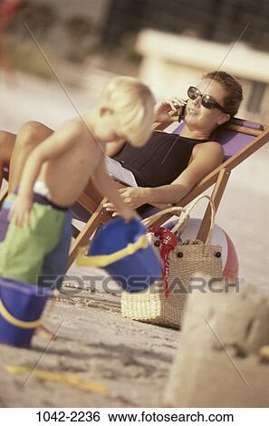 people, telephone, chair, conversation, sitting, mother, phone View Large Photo Image Stock Photograph - people, telephone, chair, conversation, sitting, mother, phone. Fotosearch