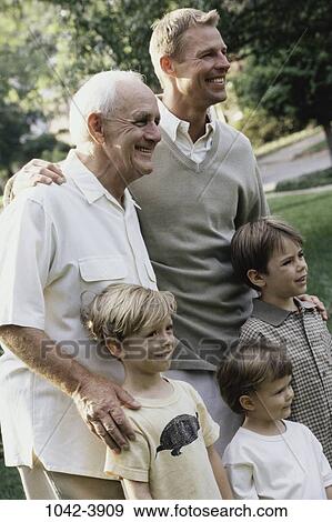 Stock Photo - people, three, outdoors, family, generations, father. Fotosearch