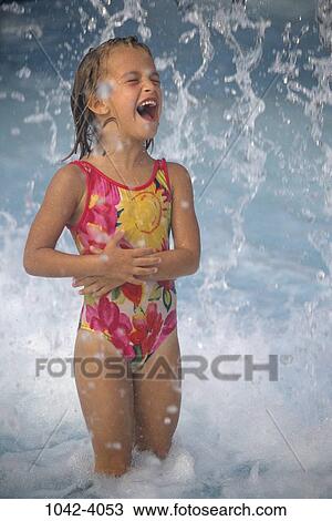 people, water, beach, laughing, splash, girl, splashing View Large Photo Image Stock Image - people, water, beach, laughing, splash, girl, splashing. Fotosearch
