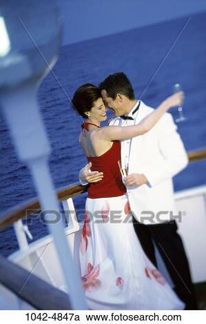 people, water, couple, ship, champagne, drinking, dancing View Large Photo Image Stock Image - people, water, couple, ship, champagne, drinking, dancing. Fotosearch