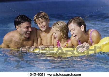 people, water, pool, laughing, outdoors, family View Large Photo Image Stock Image - people, water, pool, laughing, outdoors, family. Fotosearch