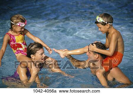 people, water, pool, playing, chicken, swimming, playful View Large Photo Image Stock Image - people, water, pool, playing, chicken, swimming, playful. Fotosearch