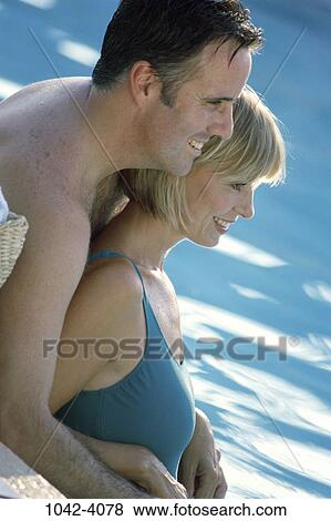 people, water, pool, profile, couple, outdoors, Middle-aged View Large Photo Image Stock Photo - people, water, pool, profile, couple, outdoors, Middle-aged. Fotosearch