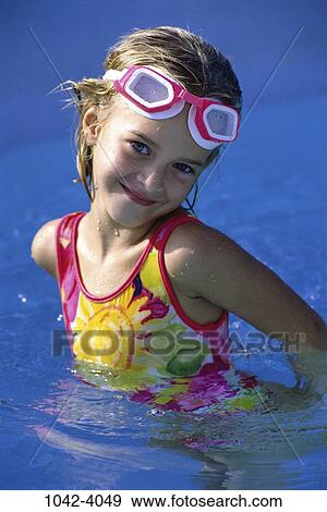 people, water, pool, smiling, beach, girl, standing View Large Photo Image Stock Photo - people, water, pool, smiling, beach, girl, standing. Fotosearch